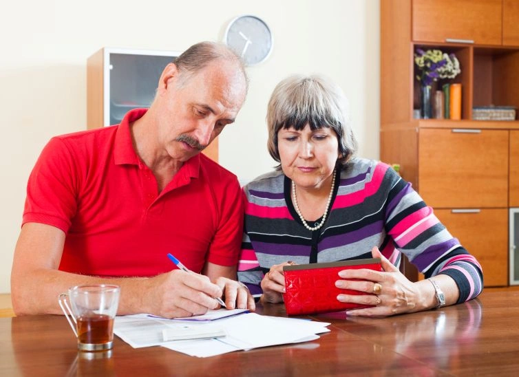 Senior couple discussing what Medicare covers